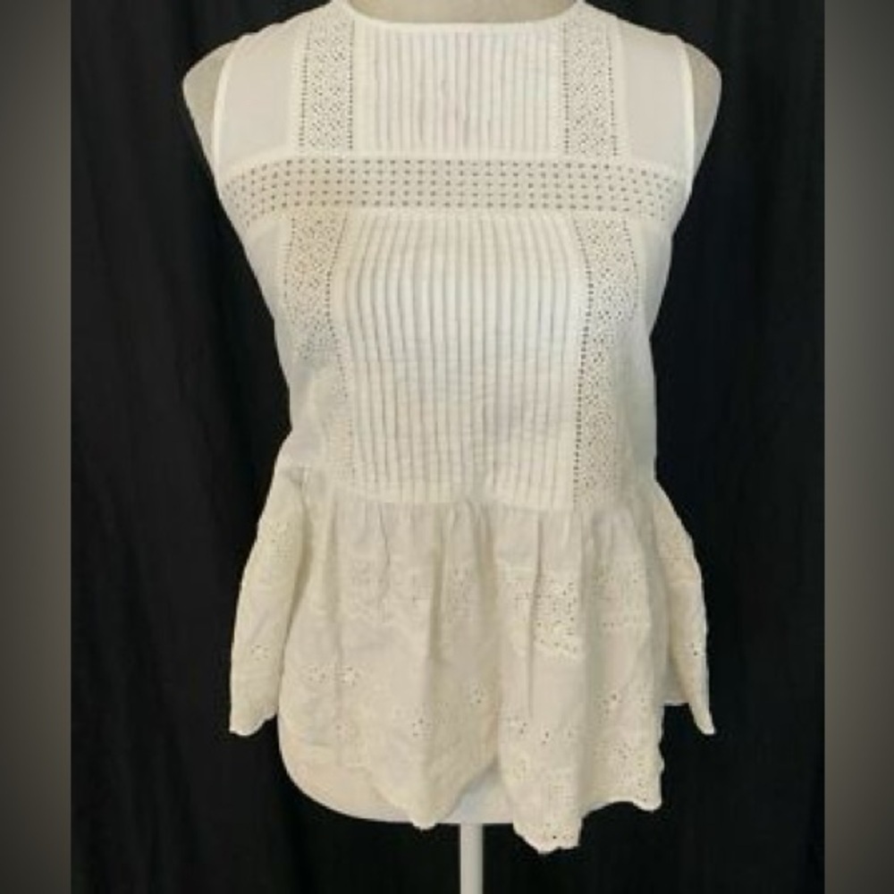 Zara women’s White Eyelet Pintuck Peplum Camisole-
Size small